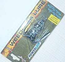 Лягушка на змееголова фирмы Стингер 55 мм- 14 гр Черная с белыми пятнами 